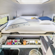 Illustration for article titled This Ingeniously Packaged Camper Packs Four People In A Tiny Van